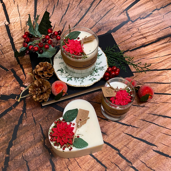 CANDLES WITH WINTER POINSETTIA