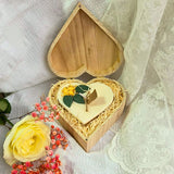 Rustic wooden heart box with lemon-decorated handmade candle